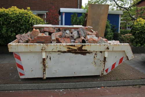 Waste collection trucks operating in Hainault